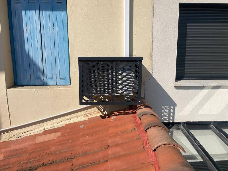 Installation d'un cache climatisation pour unité extérieure à Lacroix-Falgarde en Haute-Garonne